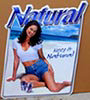 Natural Beer Girl on Beach Tin Sign